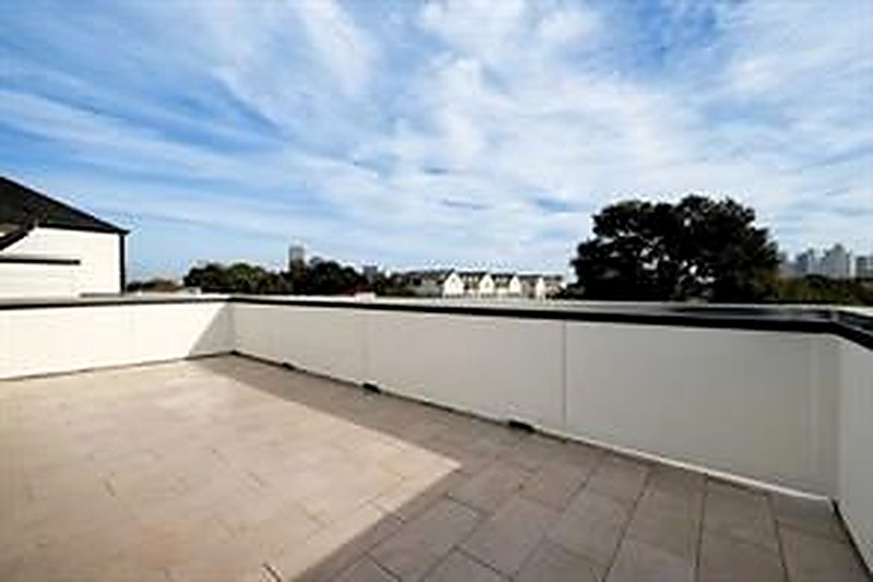 Rooftop deck with downtown Houston skyline views